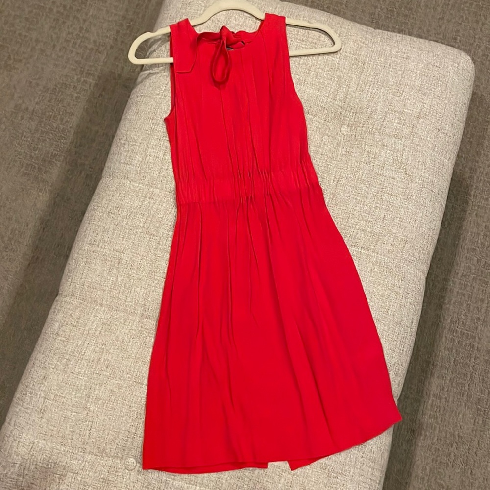 Love this red tomato dress . Very sexy and sleek